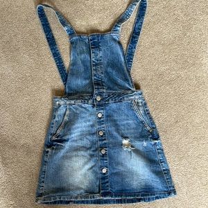Denim overall dress in size S. Brand new.